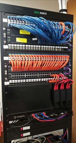 Photo of a finished cabling set up with a server